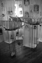 Art installation of shower curtains with the childhood photographs of the doctors who attended the conference.