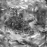 Drawings on aluminum of a heart.